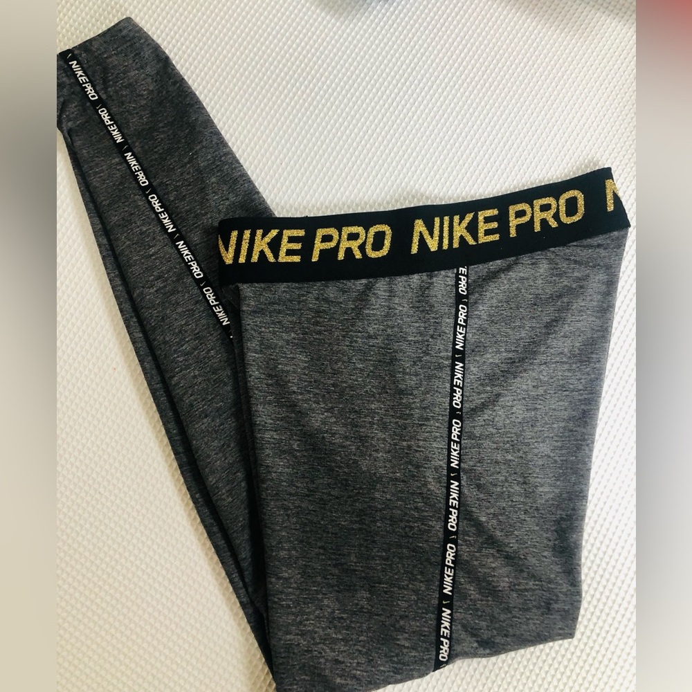 Nike Pro Gray Leggings with Gold Accents